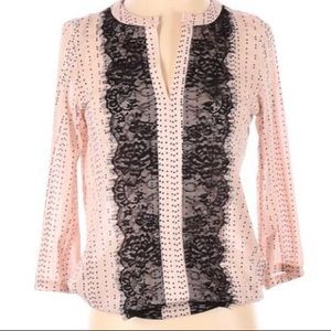 The limited pink polkadot blouse with black lace